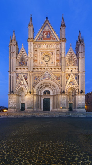 Facade of Orvieto Cathedral at dusk