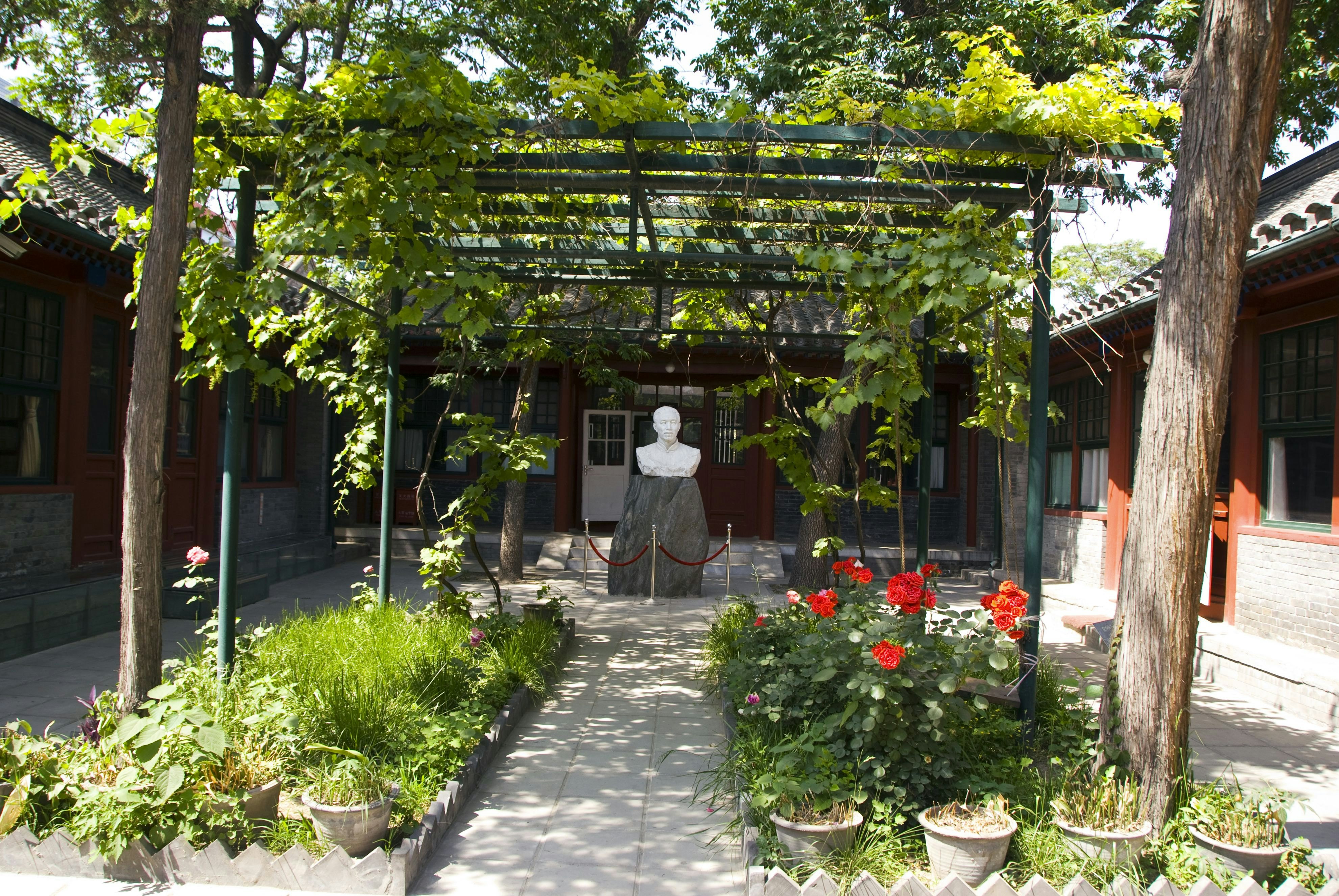 Bust of Mao Dun in the courtyard of Mao Dun Former Residence.