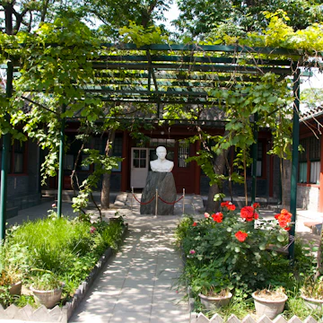 Bust of Mao Dun in the courtyard of Mao Dun Former Residence.