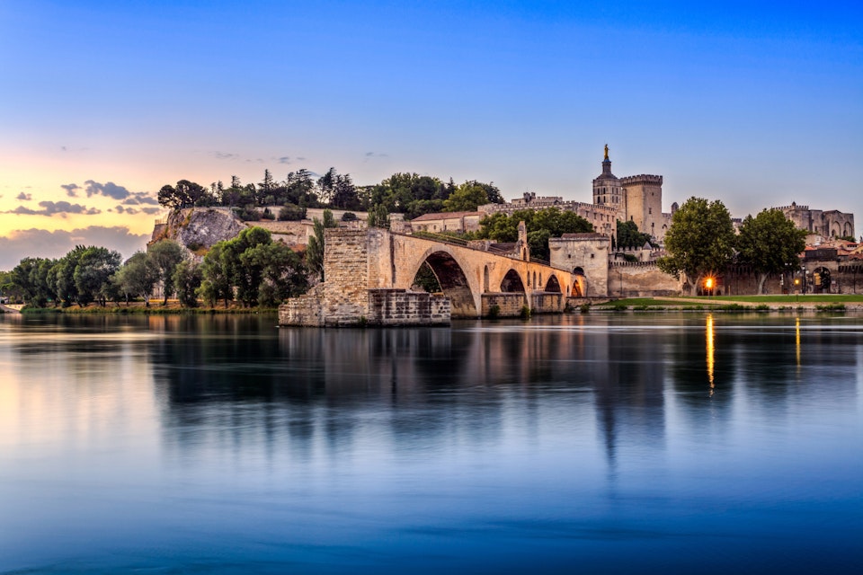 Avignon Bridge with Popes Palace and Rhone river at sunrise, Pont Saint-Benezet, Provence, France ; Shutterstock ID 362631386; Your name (First / Last): Daniel Fahey; GL account no.: 65050; Netsuite department name: Online Editorial; Full Product or Project name including edition: Best in Europe POIs