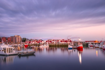 Bodo, Norway - August 2th, 2018: View of the Port of Bodo at evening in summer, Norway.; Shutterstock ID 1257926134; Your name (First / Last): Gemma Graham; GL account no.: 65050; Netsuite department name: Online Editiorial; Full Product or Project name including edition: Masthead image for Bodo, Norway