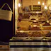 The date, fig and walnut stall next to the entrance of the Medersa El-Attarine deep in the ancient Medina of Fes, Morocco.