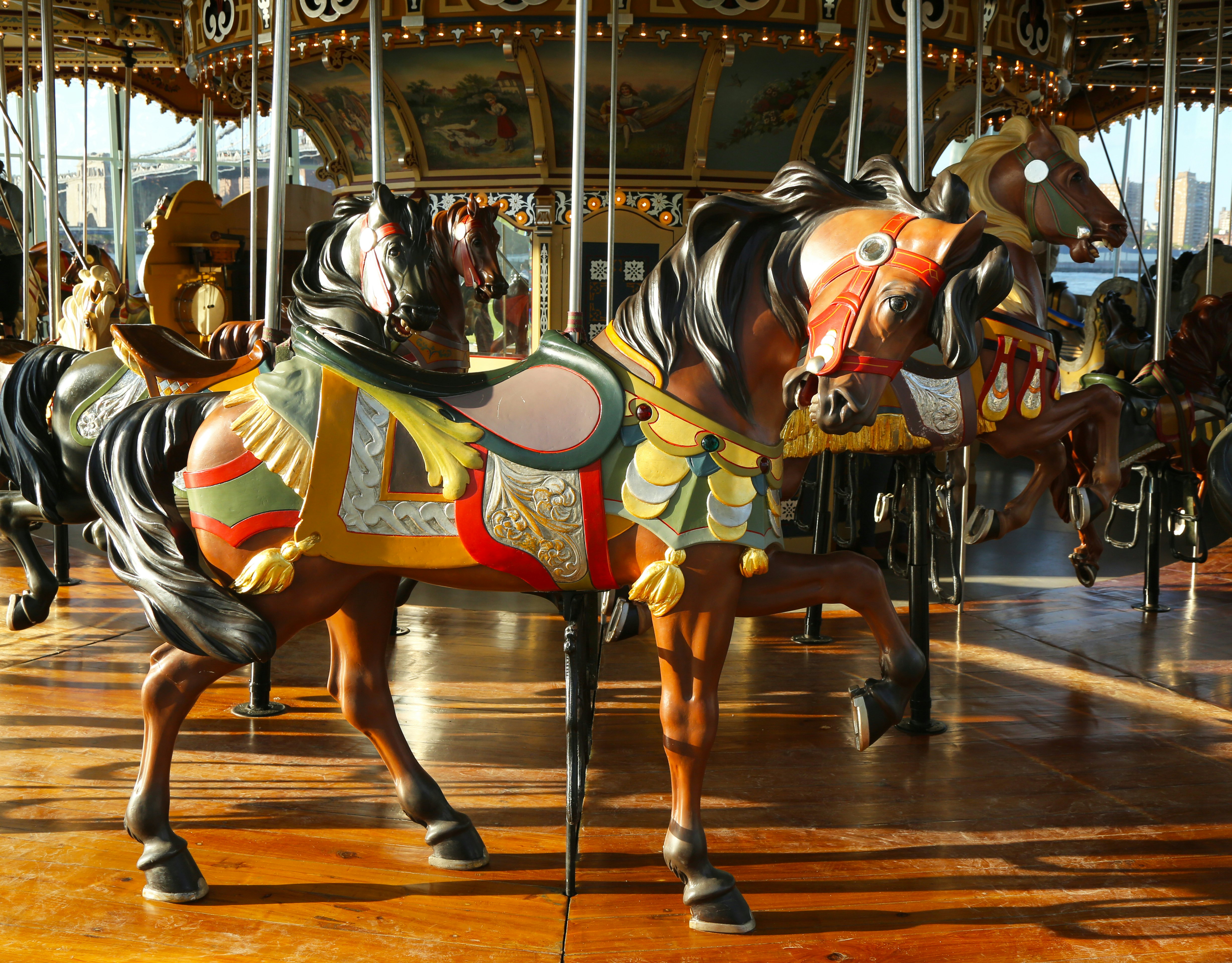 BROOKLYN, NY - MAY 26:Horses on a traditional fairground Jane's carousel in Brooklyn on May 26, 2013. It is historic and beautifully restored carousel build in 1922 a gift of Jane and David Walentas ; Shutterstock ID 147106253; Your name (First / Last): Josh Vogel; Project no. or GL code: 56530; Network activity no. or Cost Centre: Online-Design; Product or Project: 65050/7529/Josh Vogel/LP.com Destination Galleries