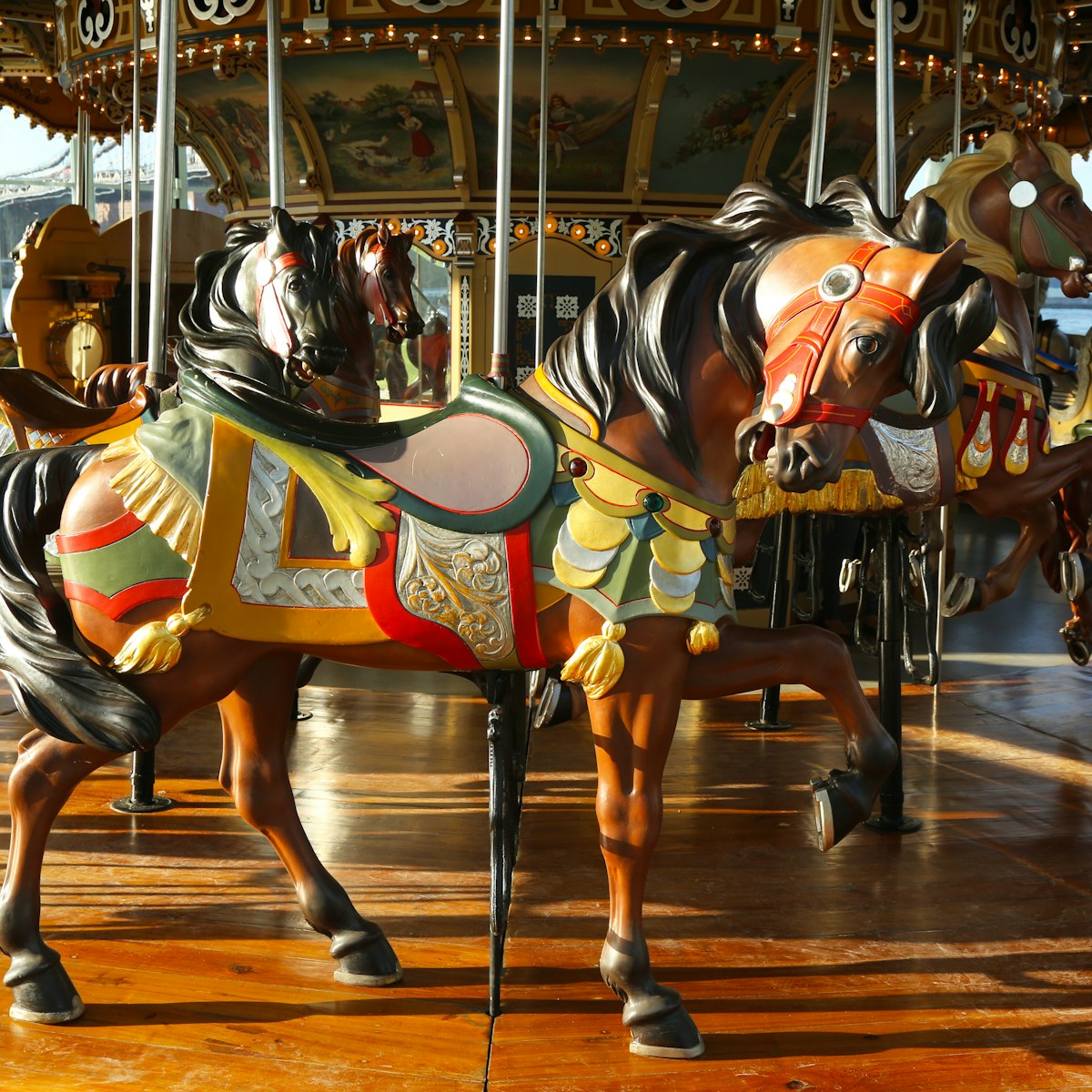 BROOKLYN, NY - MAY 26:Horses on a traditional fairground Jane's carousel in Brooklyn on May 26, 2013. It is historic and beautifully restored carousel build in 1922 a gift of Jane and David Walentas ; Shutterstock ID 147106253; Your name (First / Last): Josh Vogel; Project no. or GL code: 56530; Network activity no. or Cost Centre: Online-Design; Product or Project: 65050/7529/Josh Vogel/LP.com Destination Galleries