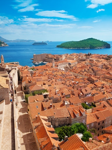 Old town of Dubrovnik with Lokrum island on background with red roofs; Shutterstock ID 151850840; Your name (First / Last): Josh Vogel; Project no. or GL code: 56530; Network activity no. or Cost Centre: Online-Design; Product or Project: 65050/7529/Josh Vogel/LP.com Destination Galleries