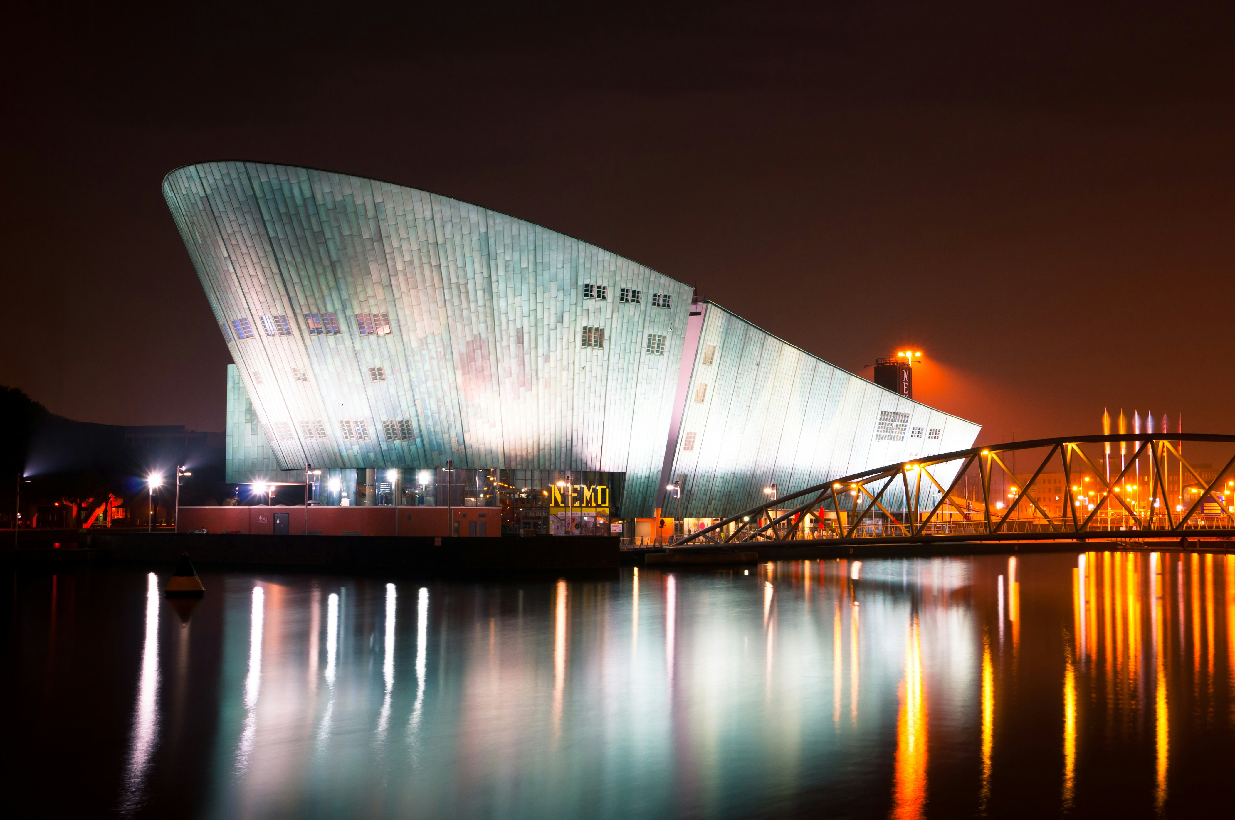 AMSTERDAM, NETHERLANDS - JULY 27: The Nemo Museum at night on July 27, 2013 in Amsterdam, Netherlands. Science Center NEMO is designed by Renzo Piano since 1997.; Shutterstock ID 162619127; Your name (First / Last): Josh Vogel; Project no. or GL code: 56530; Network activity no. or Cost Centre: Online-Design; Product or Project: 65050/7529/Josh Vogel/LP.com Destination Galleries