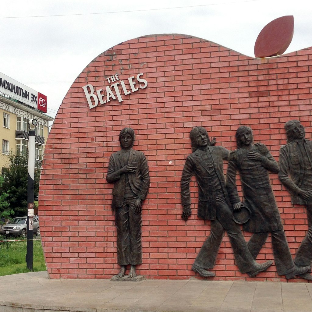ULAANBAATAR, MONGLIA - JULY 2013 - A Beatles monument in the Mongolian capital depicts Paul McCartney with death symbolism alongside the other three members of the band.; Shutterstock ID 169537319; Your name (First / Last): Josh Vogel; Project no. or GL code: 56530; Network activity no. or Cost Centre: Online-Design; Product or Project: 65050/7529/Josh Vogel/LP.com Destination Galleries