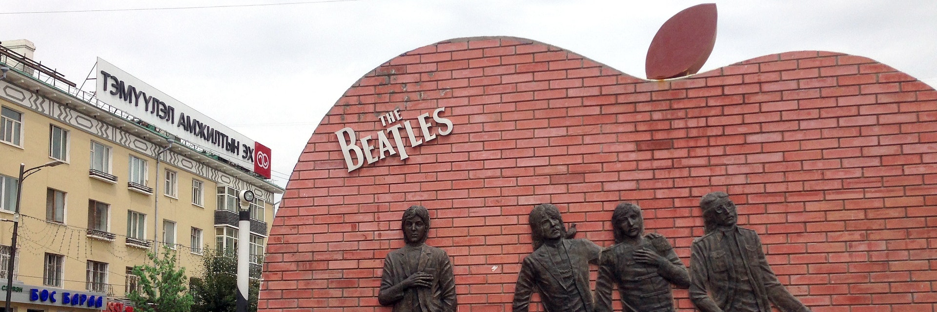 ULAANBAATAR, MONGLIA - JULY 2013 - A Beatles monument in the Mongolian capital depicts Paul McCartney with death symbolism alongside the other three members of the band.; Shutterstock ID 169537319; Your name (First / Last): Josh Vogel; Project no. or GL code: 56530; Network activity no. or Cost Centre: Online-Design; Product or Project: 65050/7529/Josh Vogel/LP.com Destination Galleries