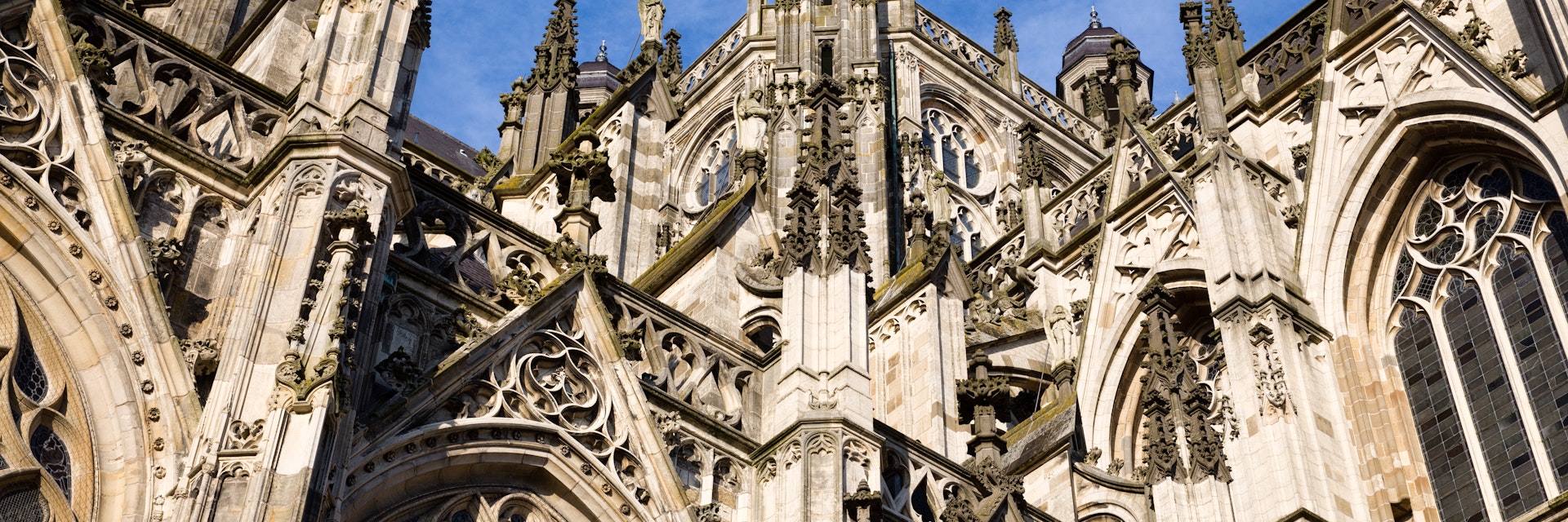 Exterior with many gothic details against a deep blue sky of the gothic medieval cathedral of Saint John, one of the top attractions of Den Bosch, 's-Hertogenbosch, Netherlands; Shutterstock ID 180468908; Your name (First / Last): Josh Vogel; Project no. or GL code: 56530; Network activity no. or Cost Centre: Online-Design; Product or Project: 65050/7529/Josh Vogel/LP.com Destination Galleries