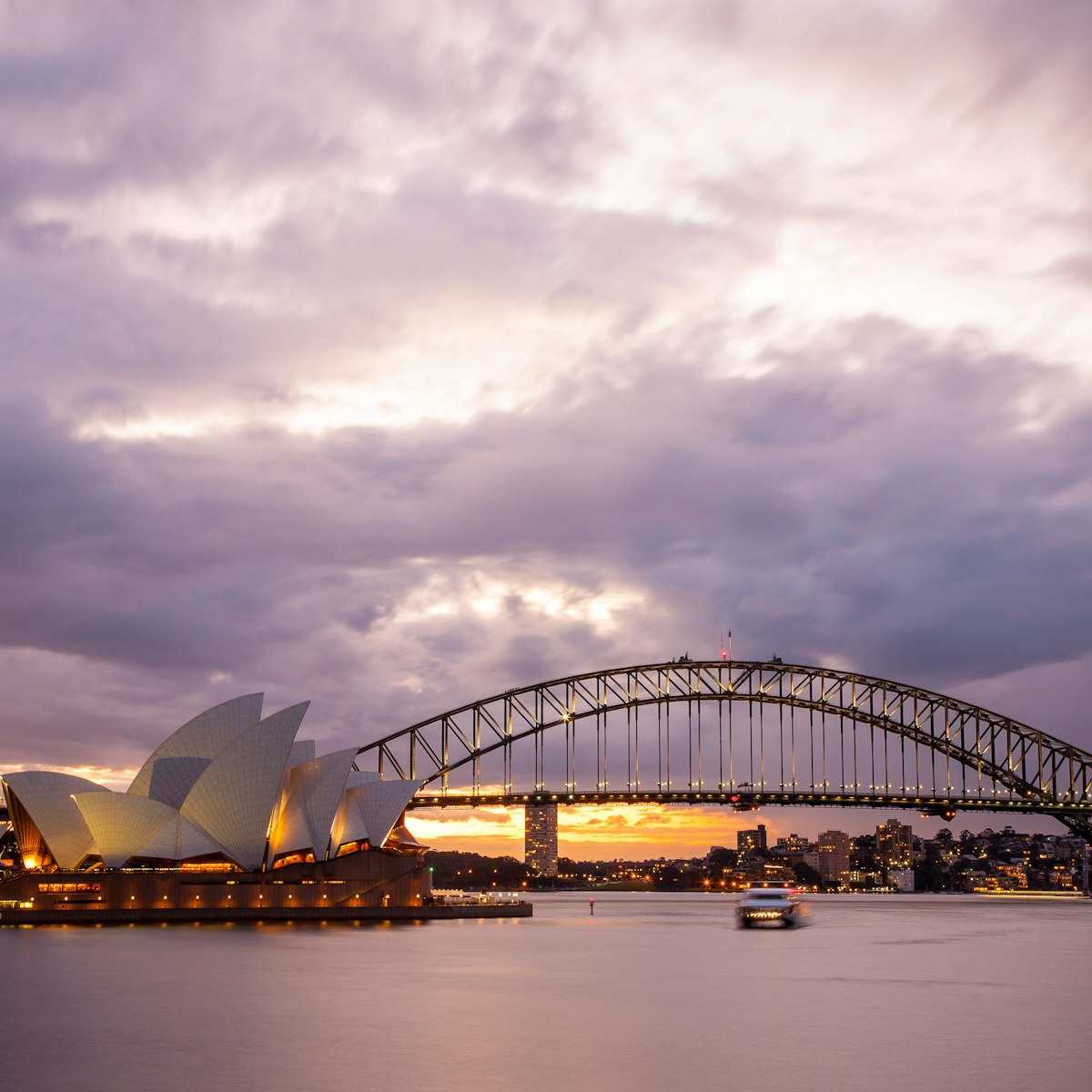 Sydney, Australia - July 11, 2010 : Dramatic sky and the Sydney Opera House at dusk. Sydney skyline taken from Mrs. Macquarie's Point.; Shutterstock ID 185348105; Your name (First / Last): Josh Vogel; Project no. or GL code: 56530; Network activity no. or Cost Centre: Online-Design; Product or Project: 65050/7529/Josh Vogel/LP.com Destination Galleries