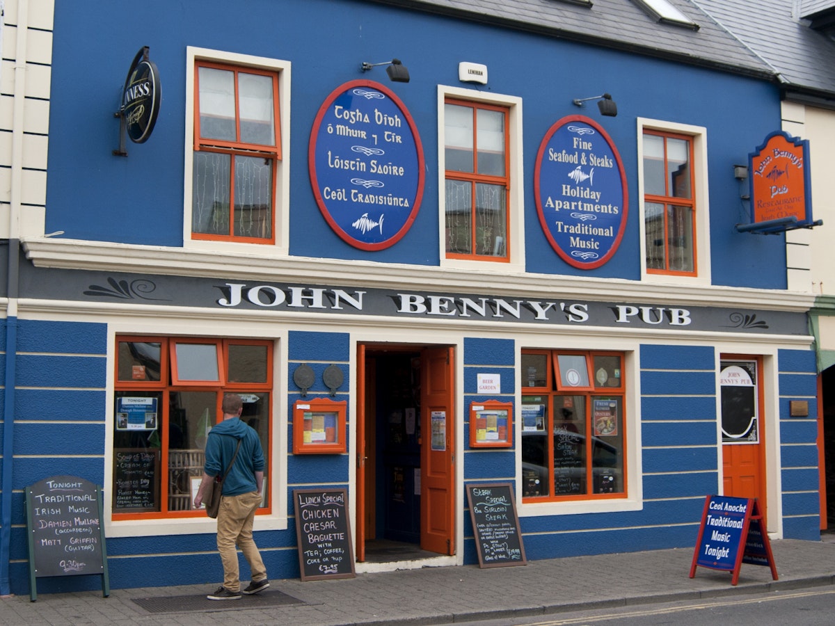 DINGLE, IRELAND - AUGUST 3, 2012 : frontage of the John Benny's pub on August 3, 2012 in Dingle, Ireland.; Shutterstock ID 213066355; Your name (First / Last): Josh Vogel; Project no. or GL code: 56530; Network activity no. or Cost Centre: Online-Design; Product or Project: 65050/7529/Josh Vogel/LP.com Destination Galleries