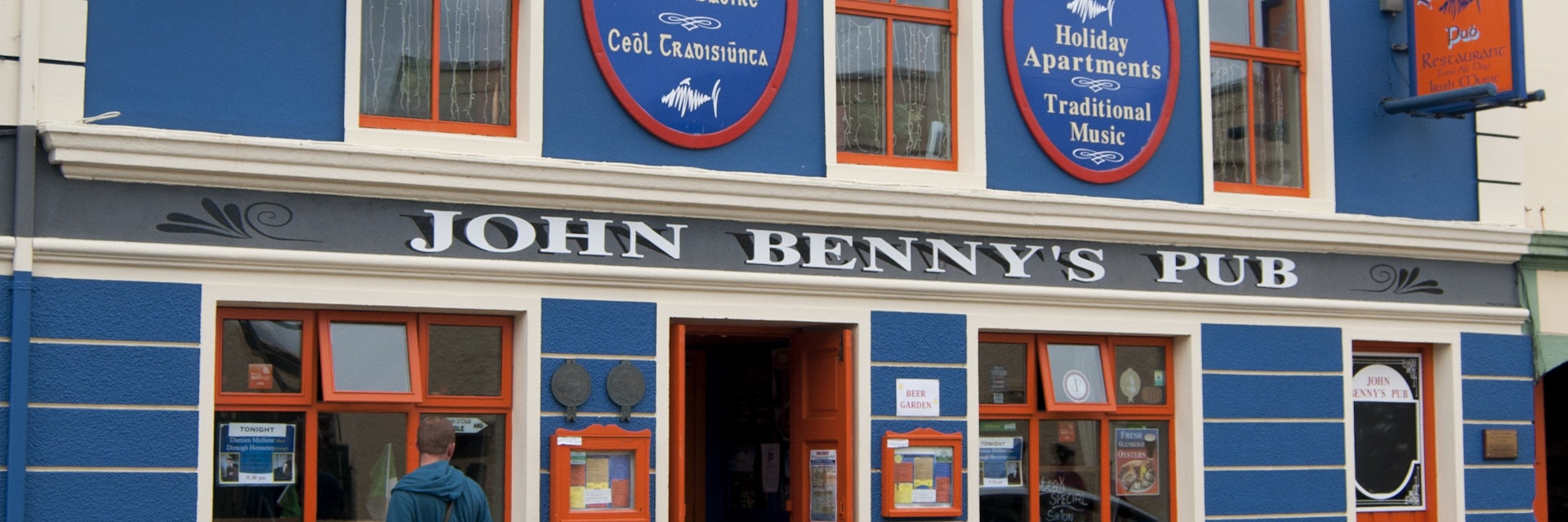 DINGLE, IRELAND - AUGUST 3, 2012 : frontage of the John Benny's pub on August 3, 2012 in Dingle, Ireland.; Shutterstock ID 213066355; Your name (First / Last): Josh Vogel; Project no. or GL code: 56530; Network activity no. or Cost Centre: Online-Design; Product or Project: 65050/7529/Josh Vogel/LP.com Destination Galleries