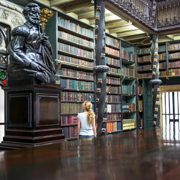 Rio De Janeiro, Brazil - September 5 2013: A girl looking at the books in the library Real Cabinete Portugues De Leitura, in the old city center; Shutterstock ID 267301388; Your name (First / Last): Josh Vogel; Project no. or GL code: 56530; Network activity no. or Cost Centre: Online-Design; Product or Project: 65050/7529/Josh Vogel/LP.com Destination Galleries