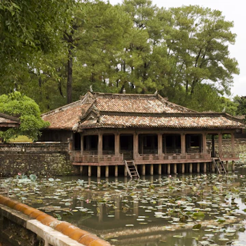 Raining on pond and lotus flower. Tu Duc Tomb, Hue. Pavilion of imperial tomb Nguyen dynasty - Vietnam; Shutterstock ID 28059859; Your name (First / Last): Josh Vogel; Project no. or GL code: 56530; Network activity no. or Cost Centre: Online-Design; Product or Project: 65050/7529/Josh Vogel/LP.com Destination Galleries