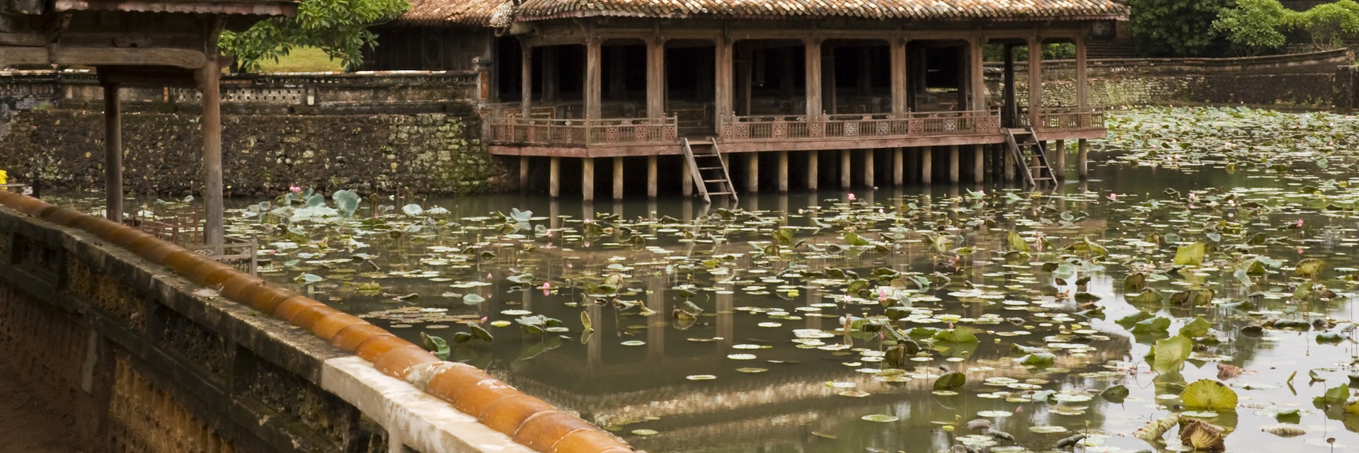 Raining on pond and lotus flower. Tu Duc Tomb, Hue. Pavilion of  imperial tomb Nguyen dynasty - Vietnam; Shutterstock ID 28059859; Your name (First / Last): Josh Vogel; Project no. or GL code: 56530; Network activity no. or Cost Centre: Online-Design; Product or Project: 65050/7529/Josh Vogel/LP.com Destination Galleries
