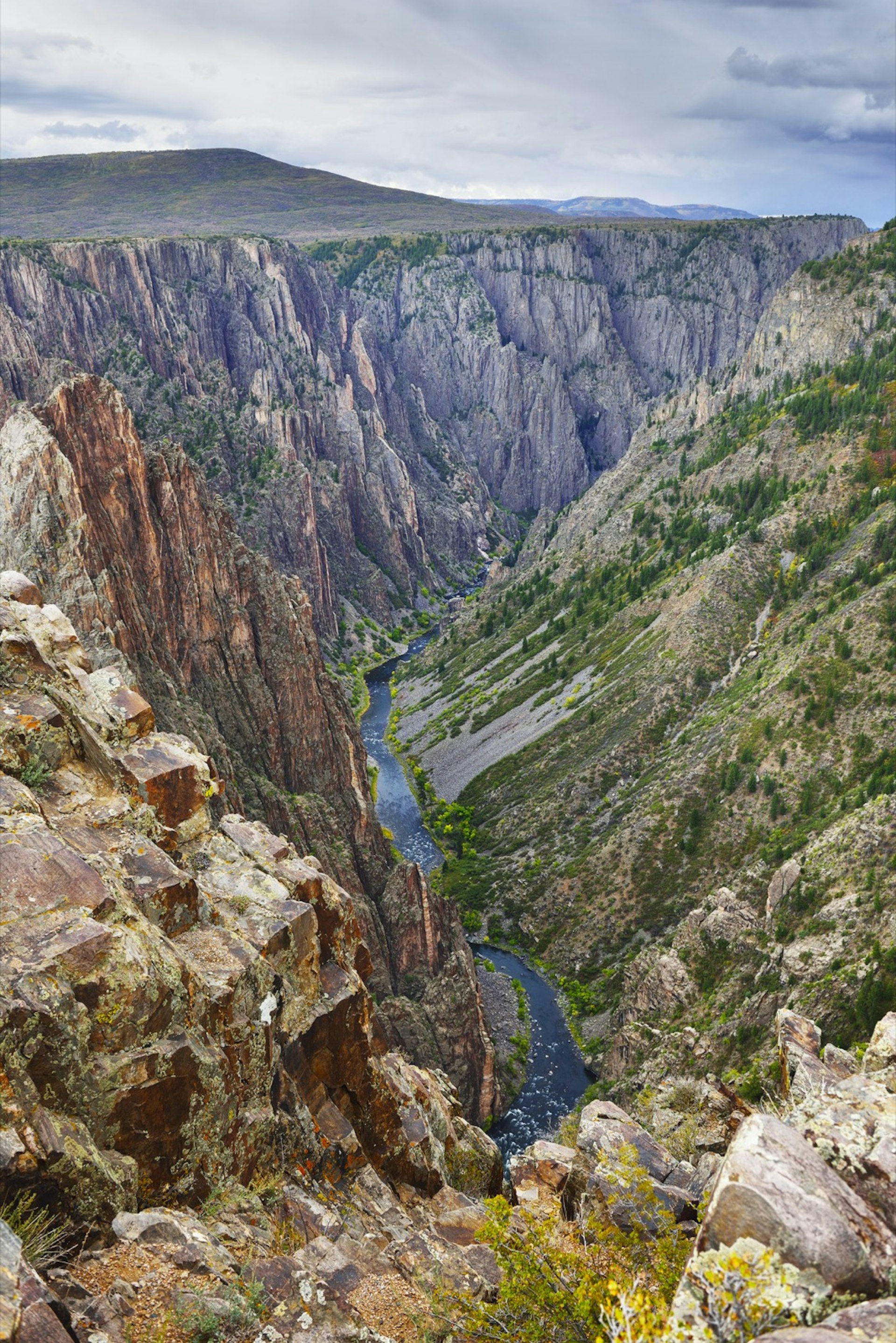 The deep gully of the Black Canyon of the Gunnison National Park with the Gunnison River below