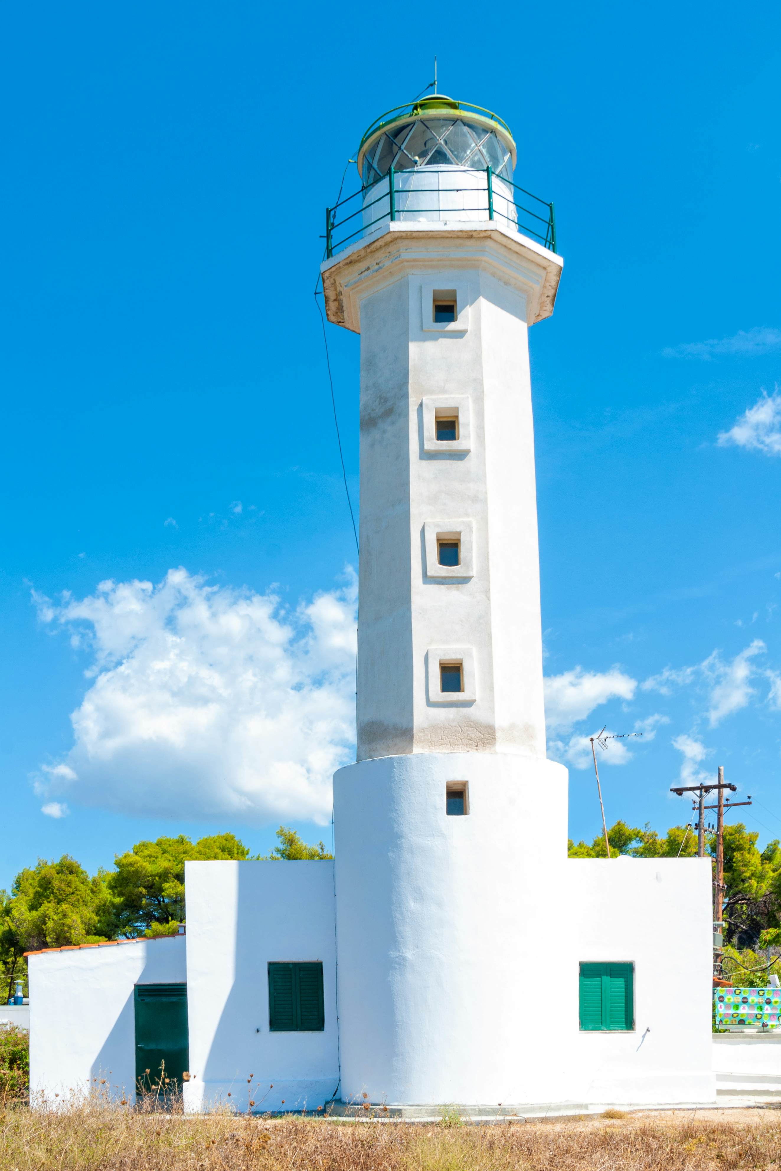 White Possidi lighthouse near Possidi cape in Greece 