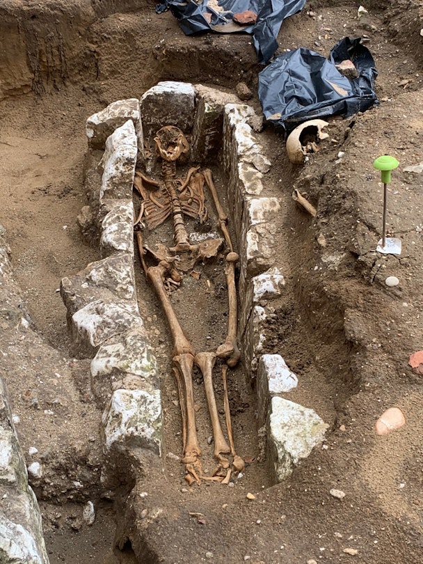 11th-century chalk-lined cist grave on the North Green, pre-dating the Great Sacristy. Picture taken in August 2020 during archaeological excavations on the site.