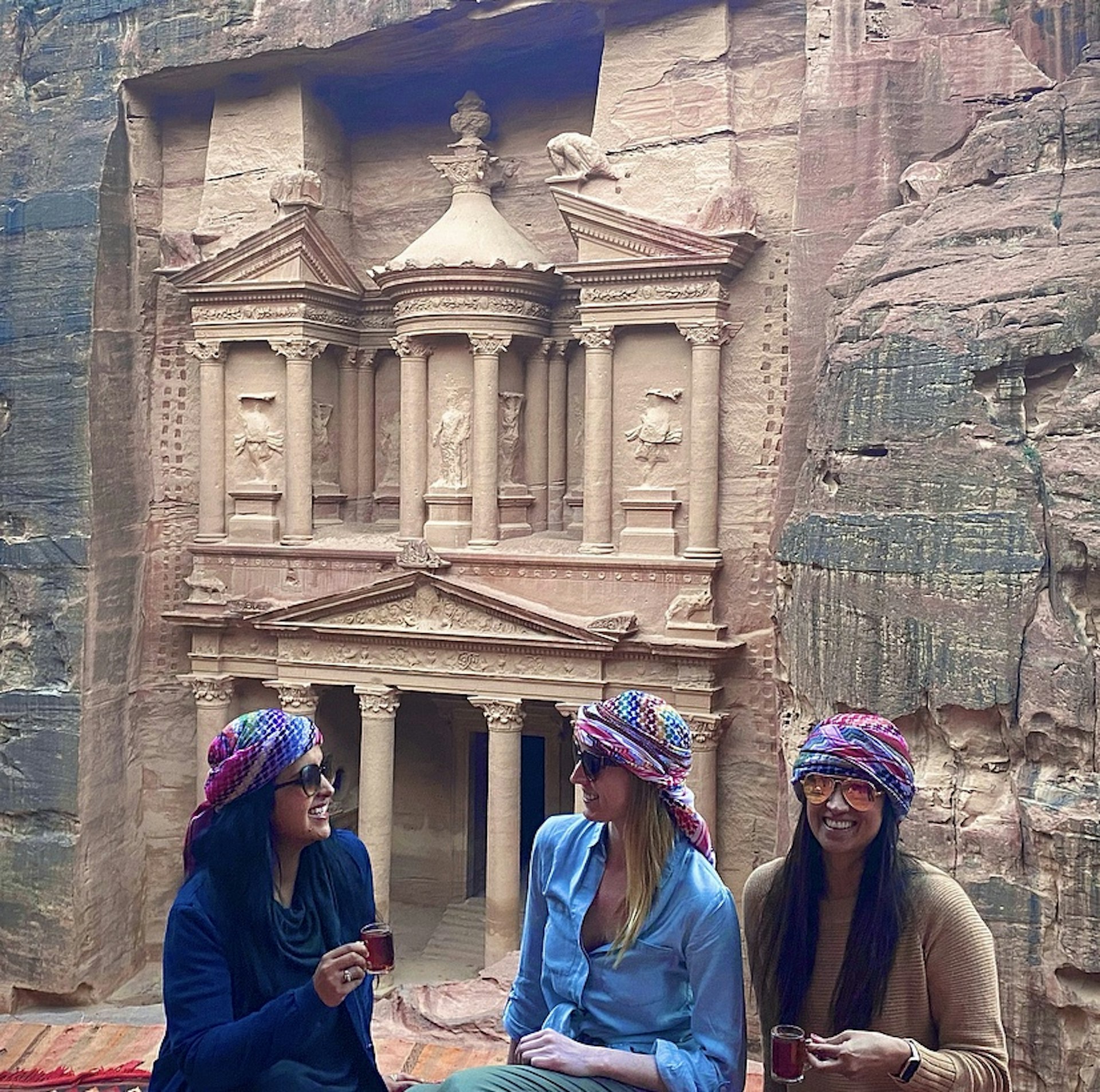 Aparna Shewakramani and friends in traditional Bedouin headscarves in Wadi Rum