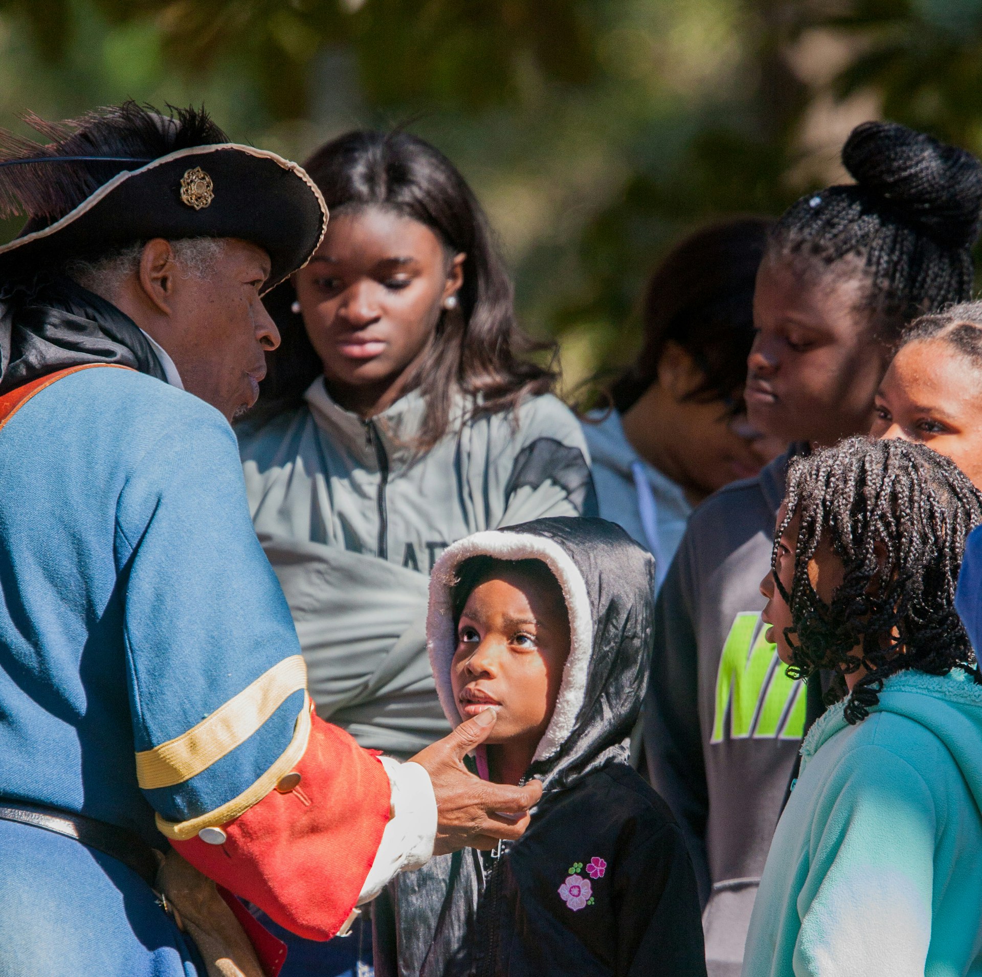 historic reenactors in colonial clothes bring to life the history of Fort Mose, the first legally sanctioned settlement of free Africans in the US