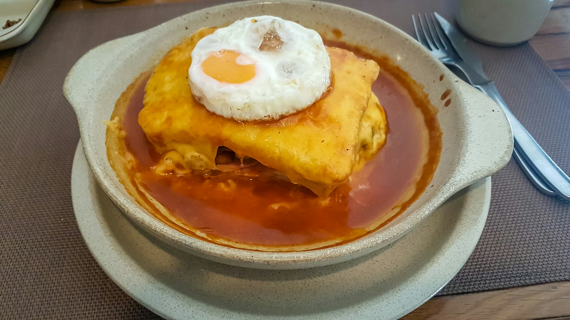 Francesinha (meaning Little Frenchie or simply Frenchie in Portuguese) is a Portuguese sandwich originally from Porto