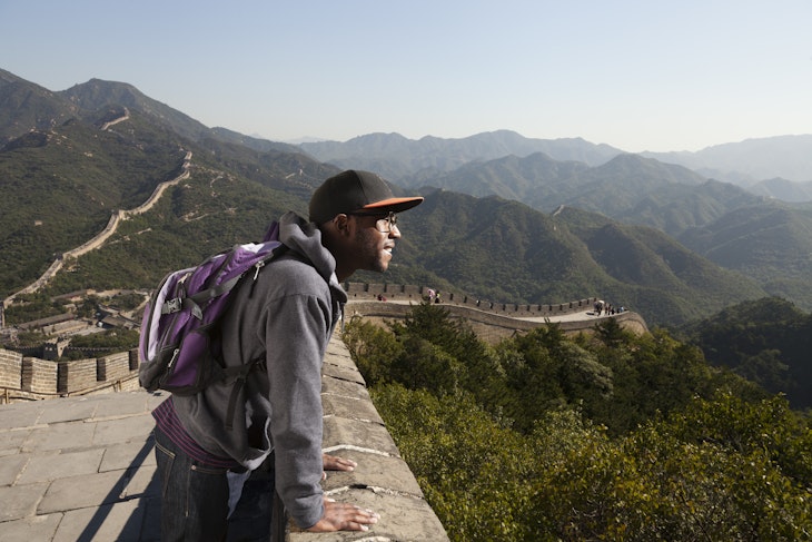 Black man standing on Great Wall of China, Beijing, Beijing, China