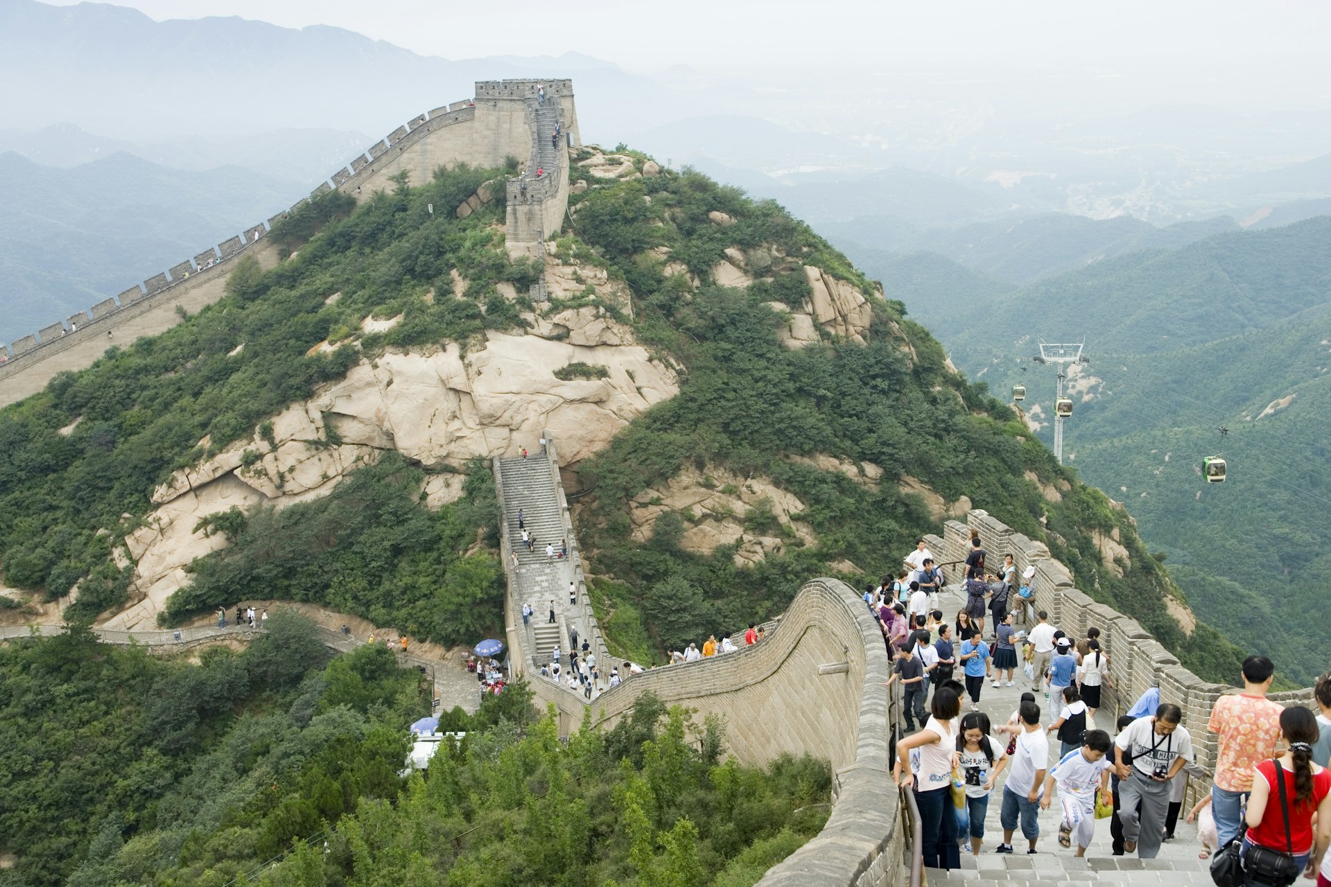 Crowds walk across the Great Wall of China