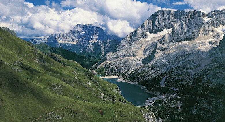 ITALY - MAY 05:  Marmolada (3342 metres) and Lake Fedaia, Mount Civetta in the background, Dolomites (UNESCO World Heritage List, 2009), Trentino-Alto Adige, Veneto, Italy. (Photo by DeAgostini/Getty Images)