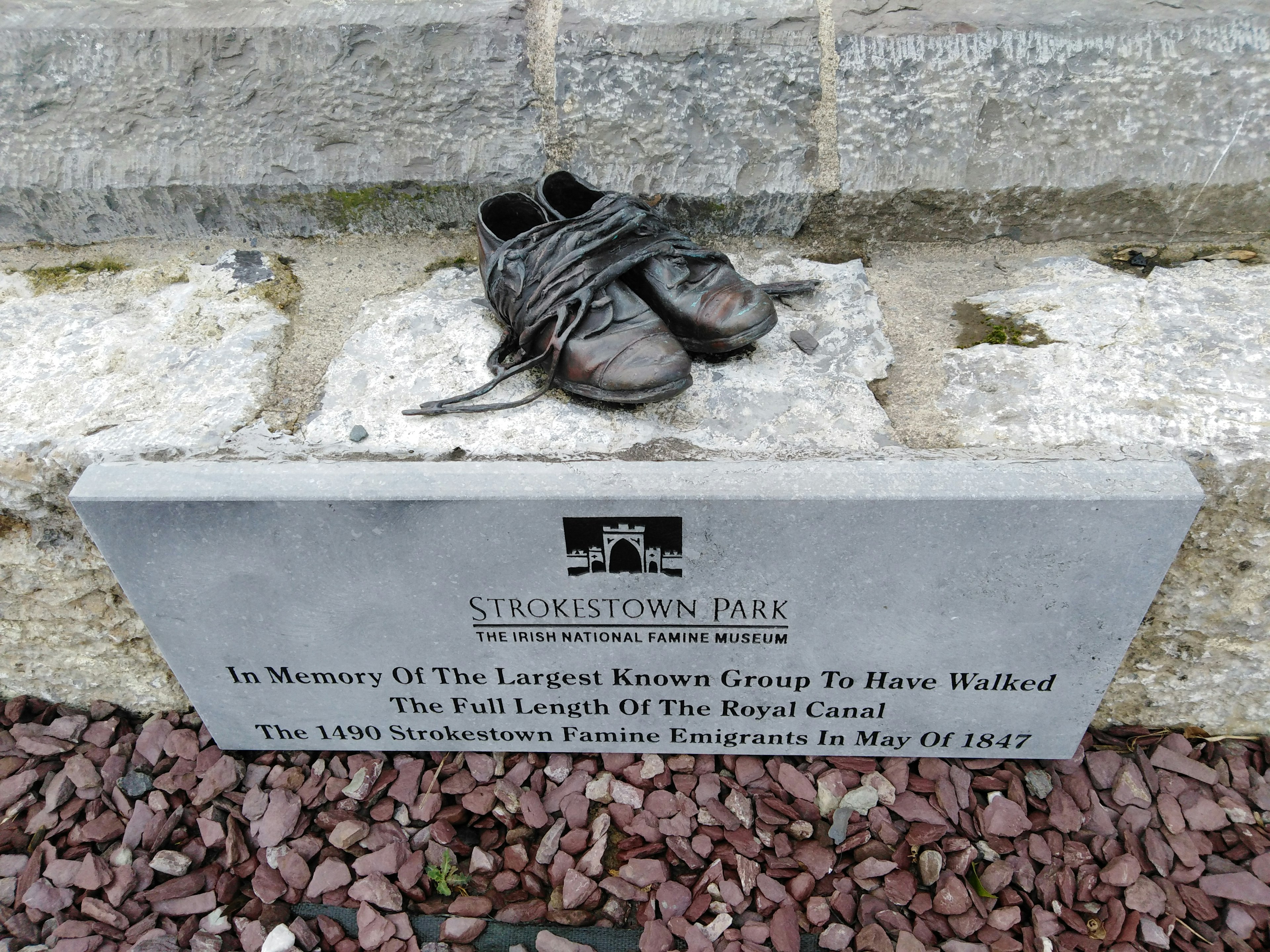 A pair of bronze children's shoes