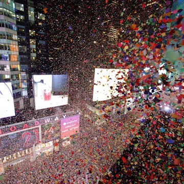 NEW YORK, NY - JANUARY 1: Confetti fills the air over top of revelers during New Year's Eve celebrations in Times Square on January 1, 2020 in New York City. (Photo by Gary Hershorn/Getty Images)