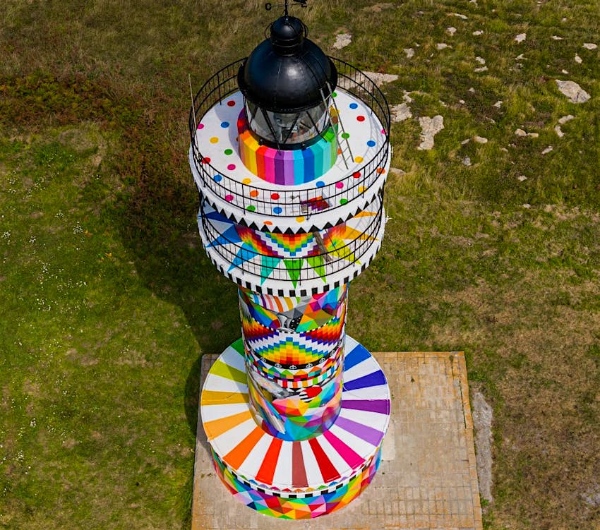 This Spanish lighthouse has been given a rainbow transformation - Lonely Planet