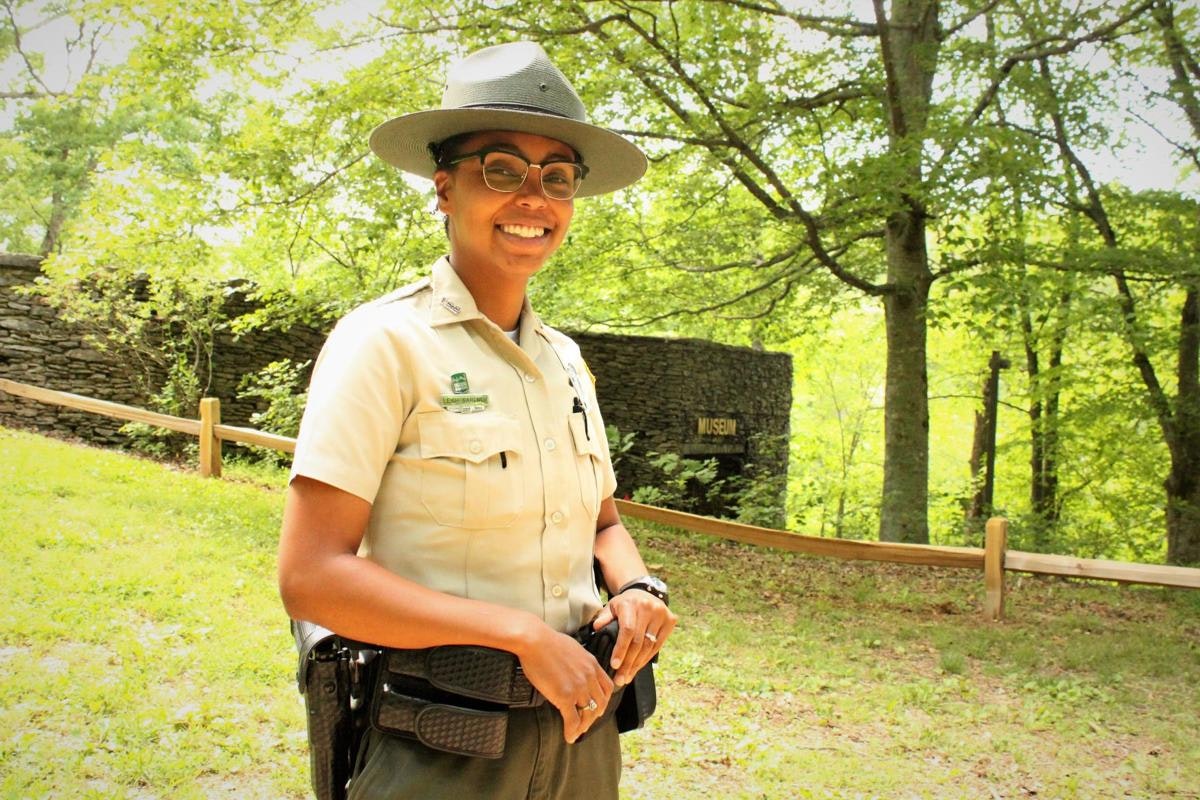 A black woman in ranger uniform smiles for the camera
