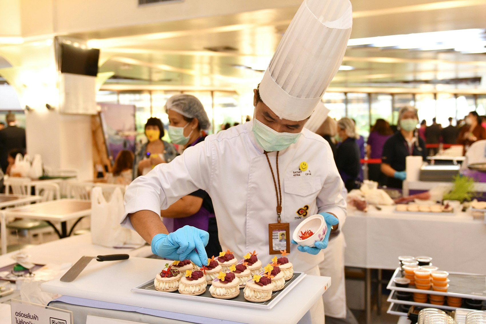 Thai Airways chef preparing dishes for the plane-themed popup