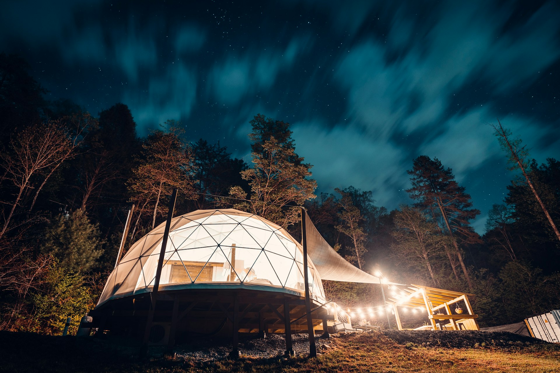 A picture of the glamping dome under a starry sky