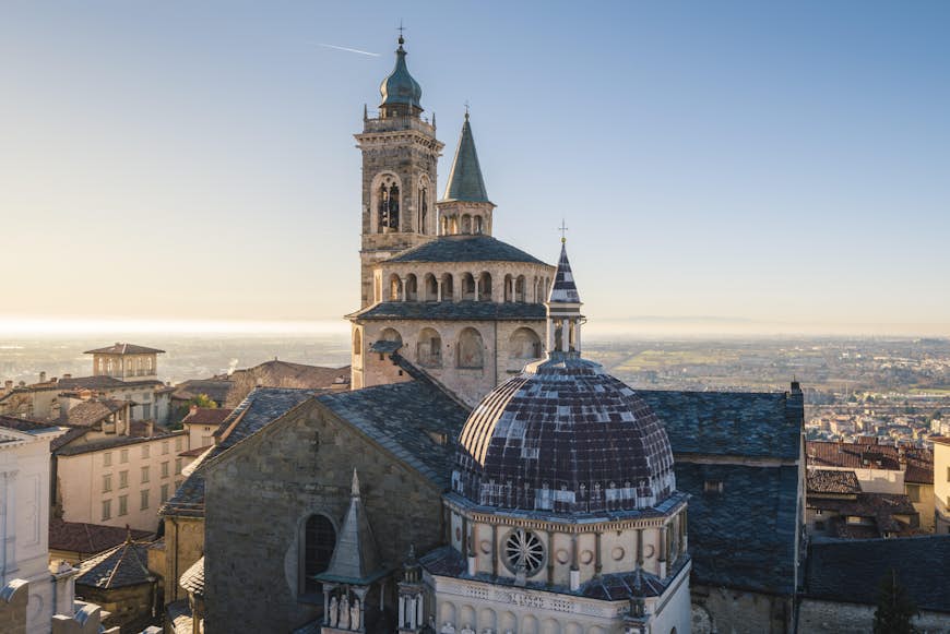 View of the cityscape and Saint Mary Major Basilica of Bergamo, Italy. 