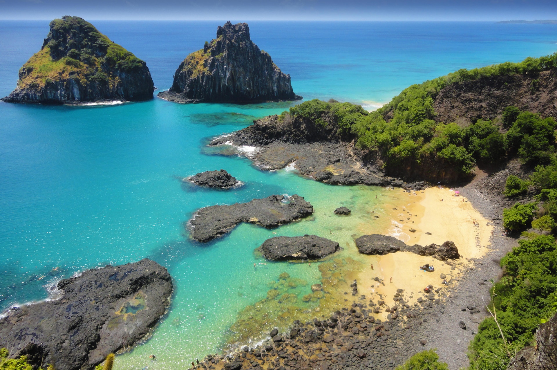 High-angle view of a tropical beach with a coral reef at Fernando de Noronha.