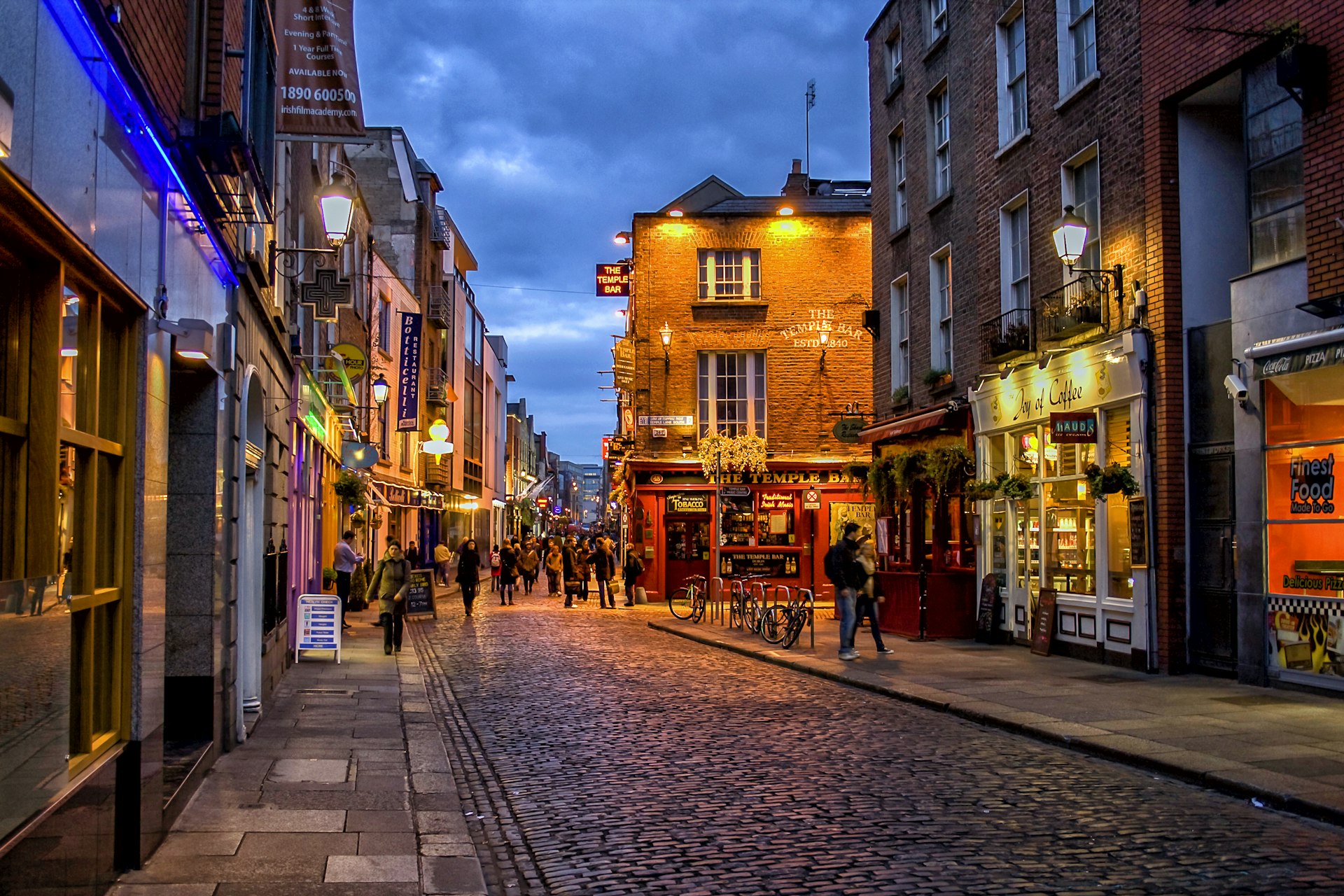 500px Photo ID: 100904953 - People at night in the Temple Bar district in Dublin. The Temple bar district is famous for his pubs and other nightlife entertainment
