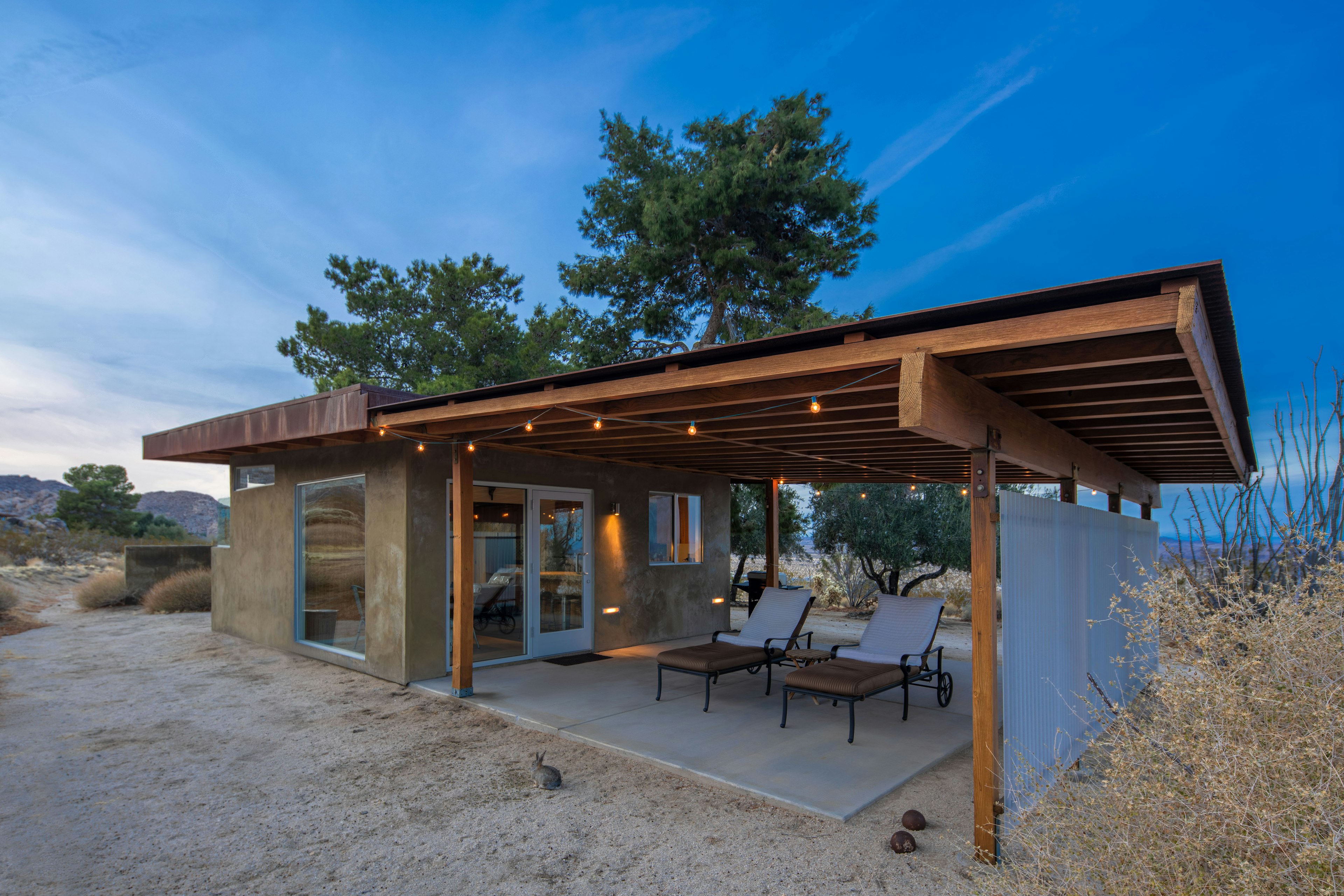 A modernist home with an open patio near Joshua Tree National Park