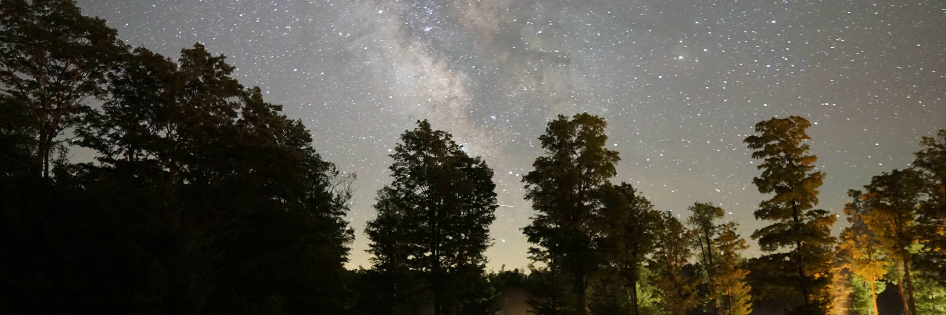 Night sky with the Milky Way above Cherry Springs State Park.