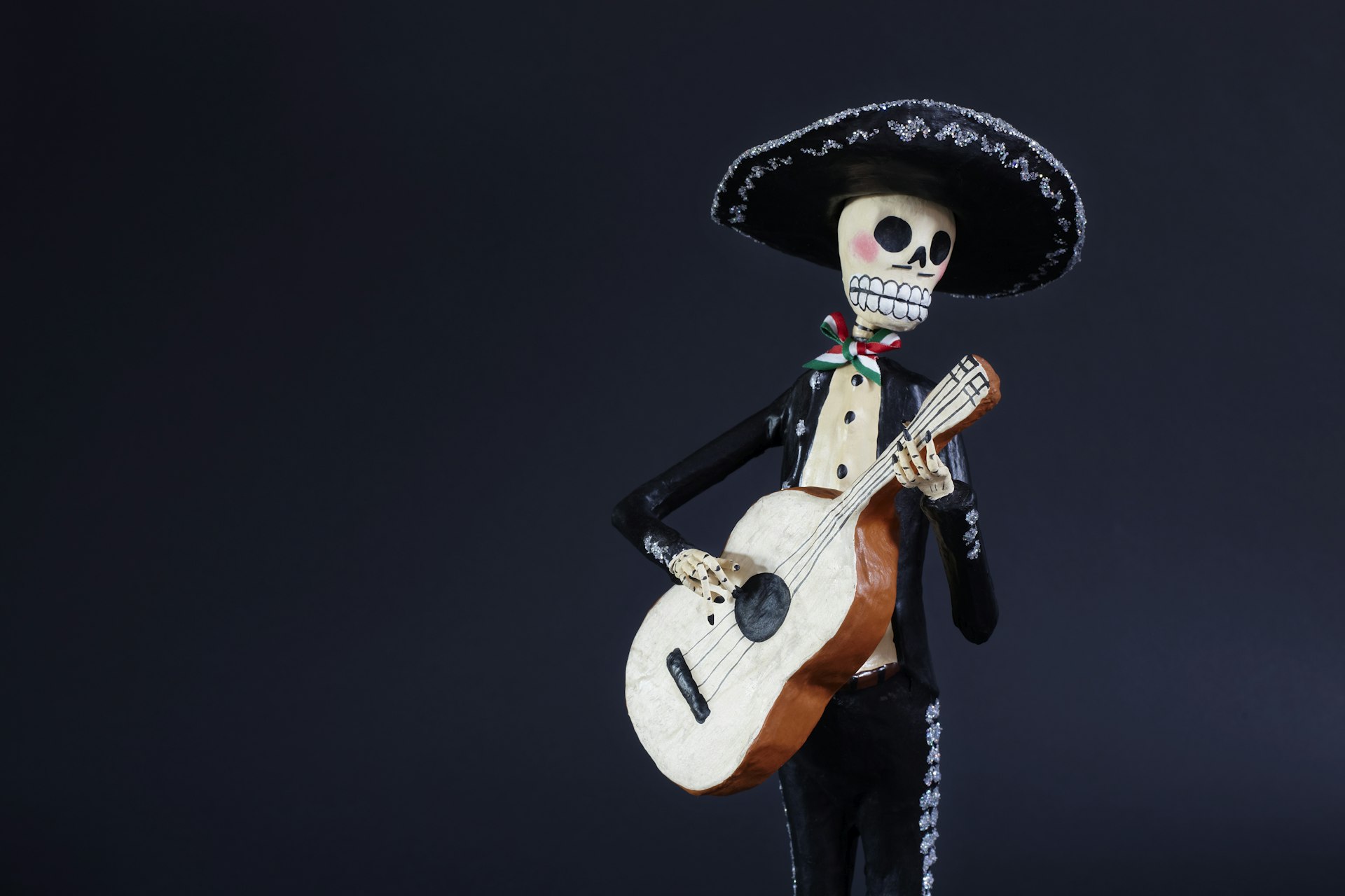 Day of the Dead doll Mariachi Guitarron player
