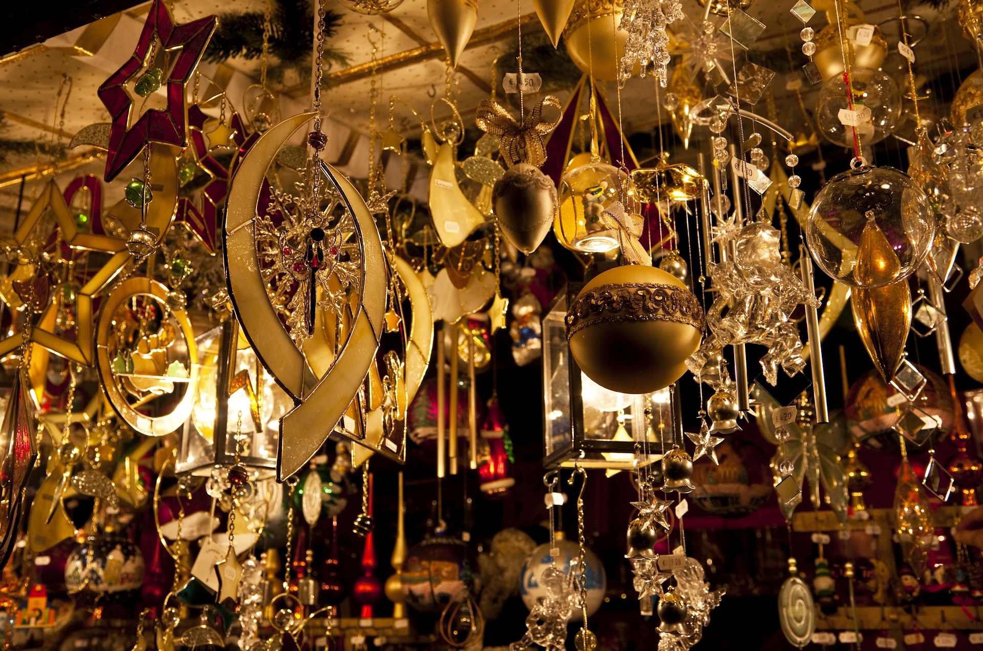 Golden glass and crystal Christmas ornaments on sale at Christmas market
