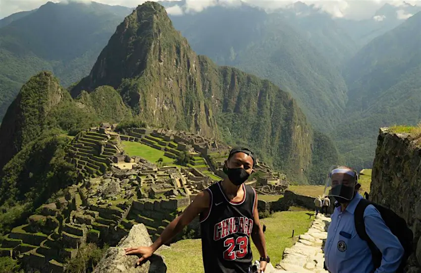 Jesse Katayama MP.png Japanese tourist Jesse Kamayata and a Machu Picchu official on a tour of the World Heritage Site