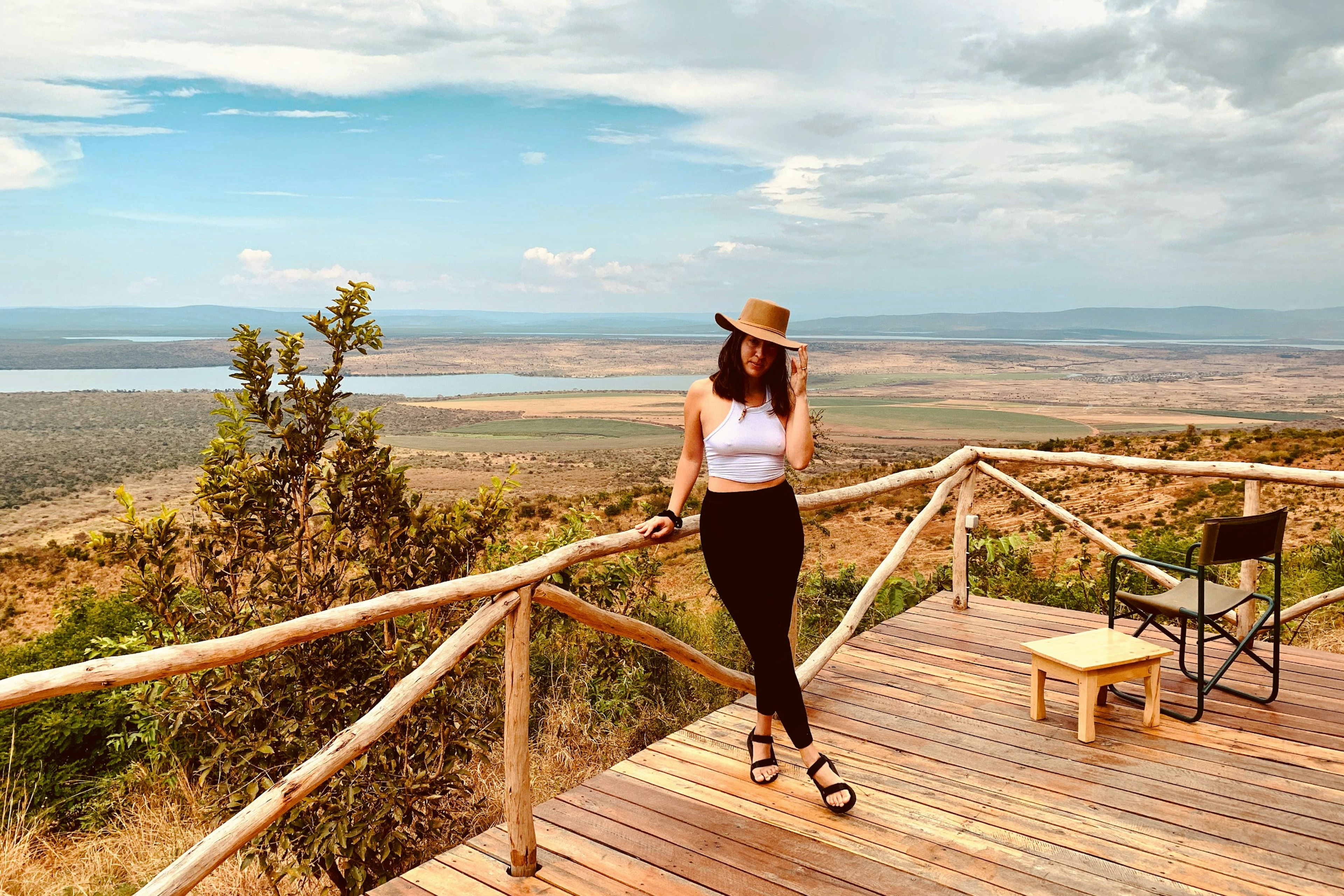 Melany Rabideau standing on a veranda in Rwanda