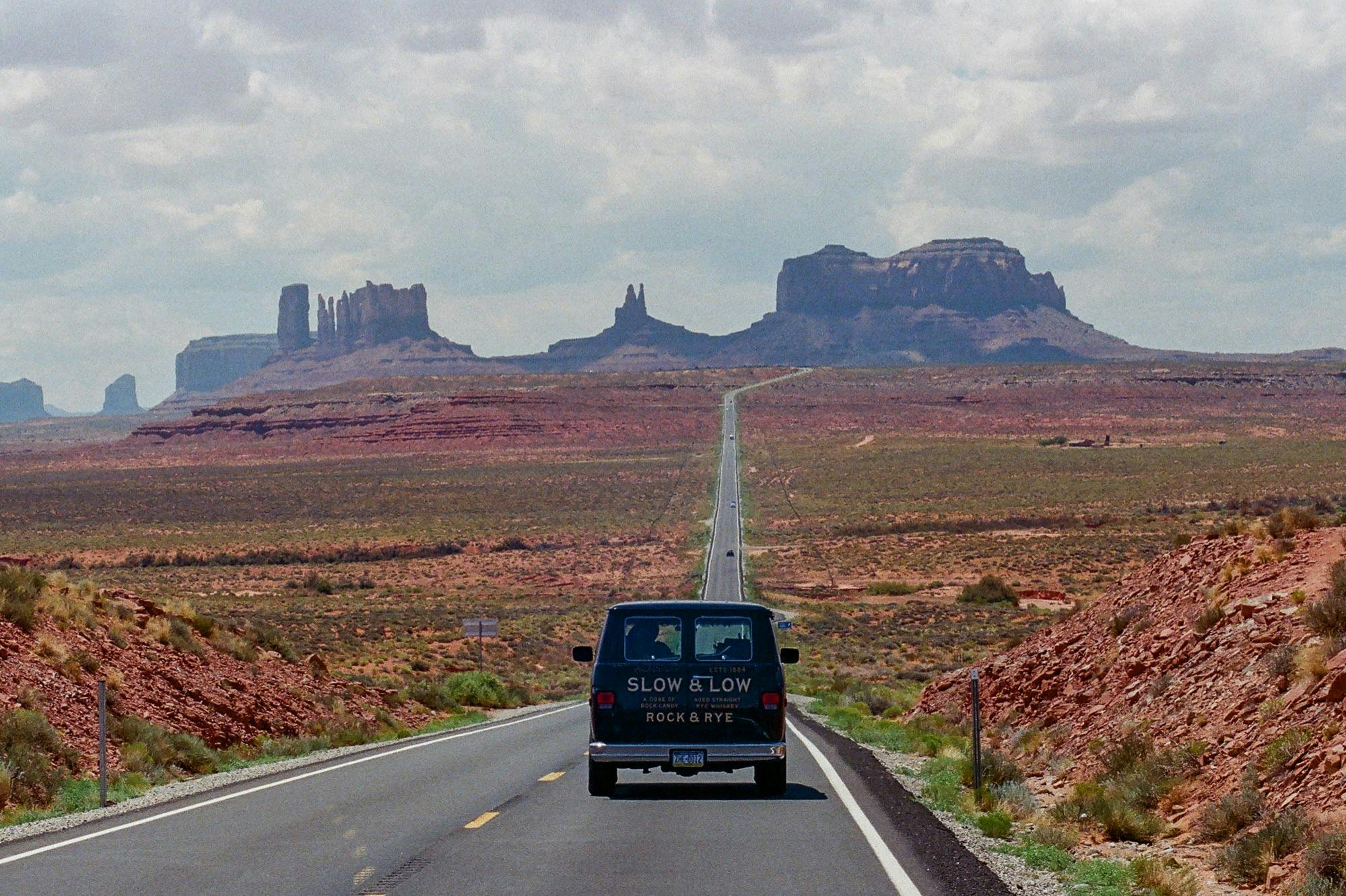 A drinks-branded van on a road in the US