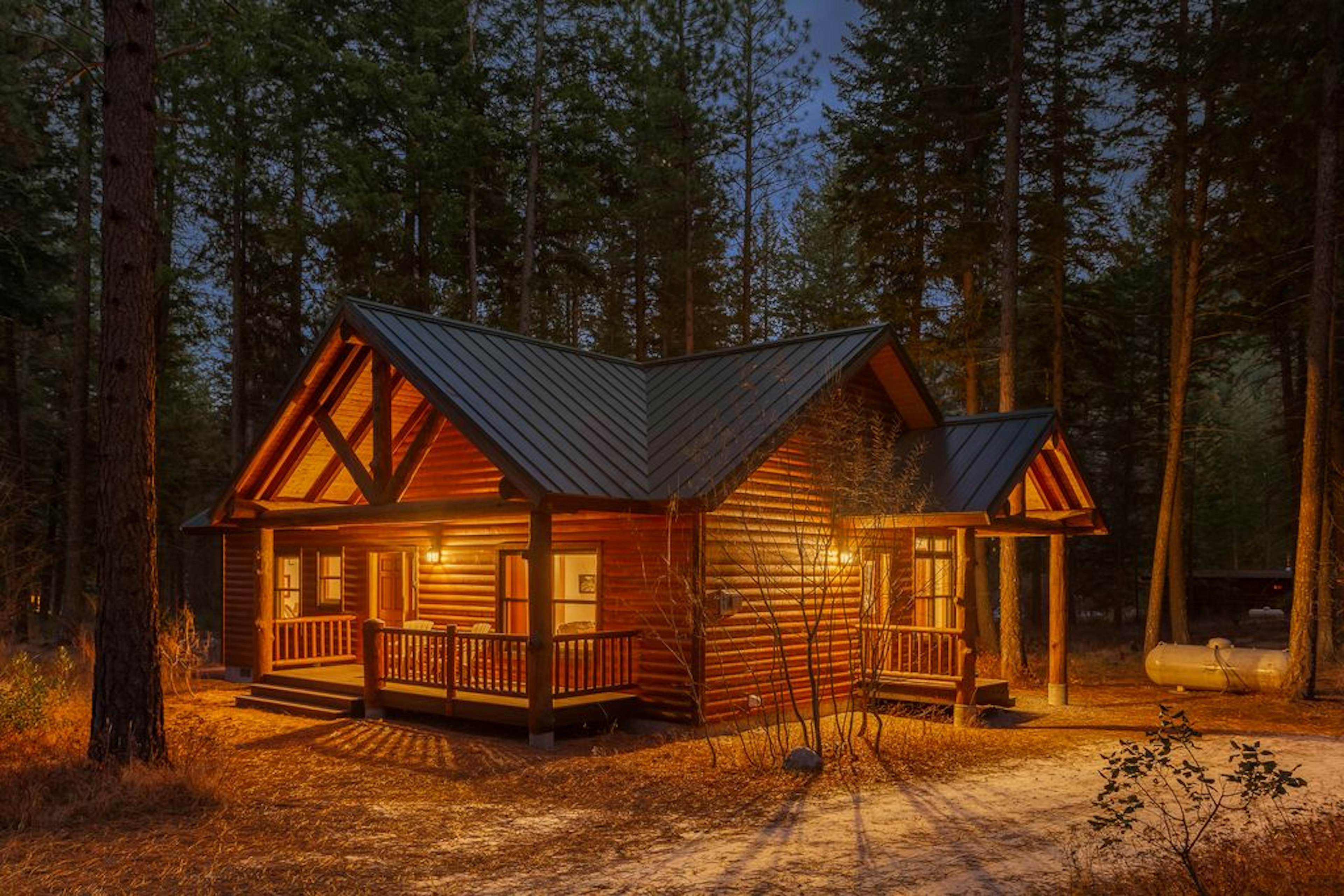 A cabin in the woods on a snowy night