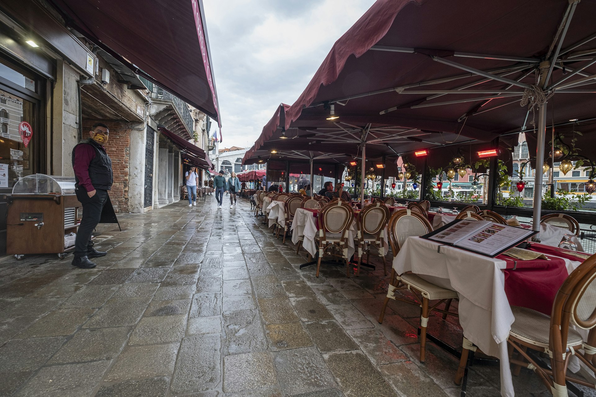 A picture of a restaurant in Venice exceptionally dry during high tide