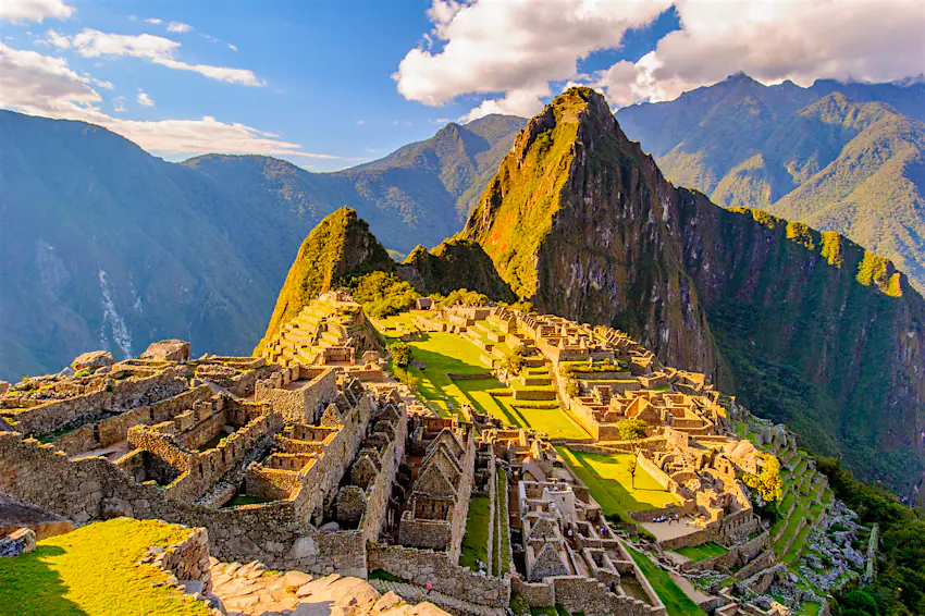 shutterstockRF_389136313.jpg The afternoon sun bathing Machu Picchu in a warm light