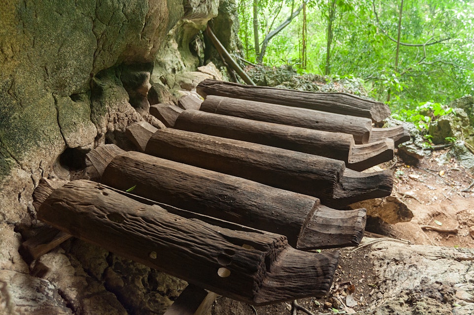 Kinabatangan Sabah Malaysia May 9, 2016 : Carved coffin made from belian tree believed to be about 500-690 years old at ancient burial cave Agop Batu Tulug in Kinabatangan Sabah.; Shutterstock ID 419637439; Your name (First / Last): Lauren Vastine; GL account no.: 65050; Netsuite department name: Online Editorial; Full Product or Project name including edition: BiA Imagery