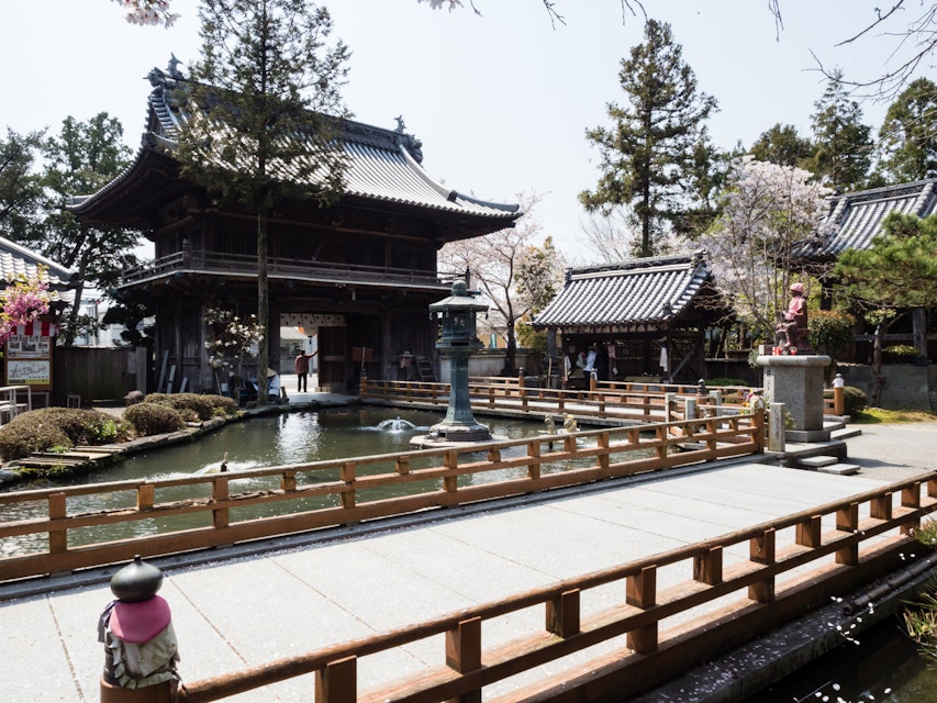 Naruto, Japan - April 2, 2018: On the grounds of Ryozenji, temple number 1 of Shikoku-henro pilgrimage; Shutterstock ID 1264858930; Your name (First / Last): Lauren Vastine; GL account no.: 65050; Netsuite department name: Online Editorial; Full Product or Project name including edition: BiA Imagery