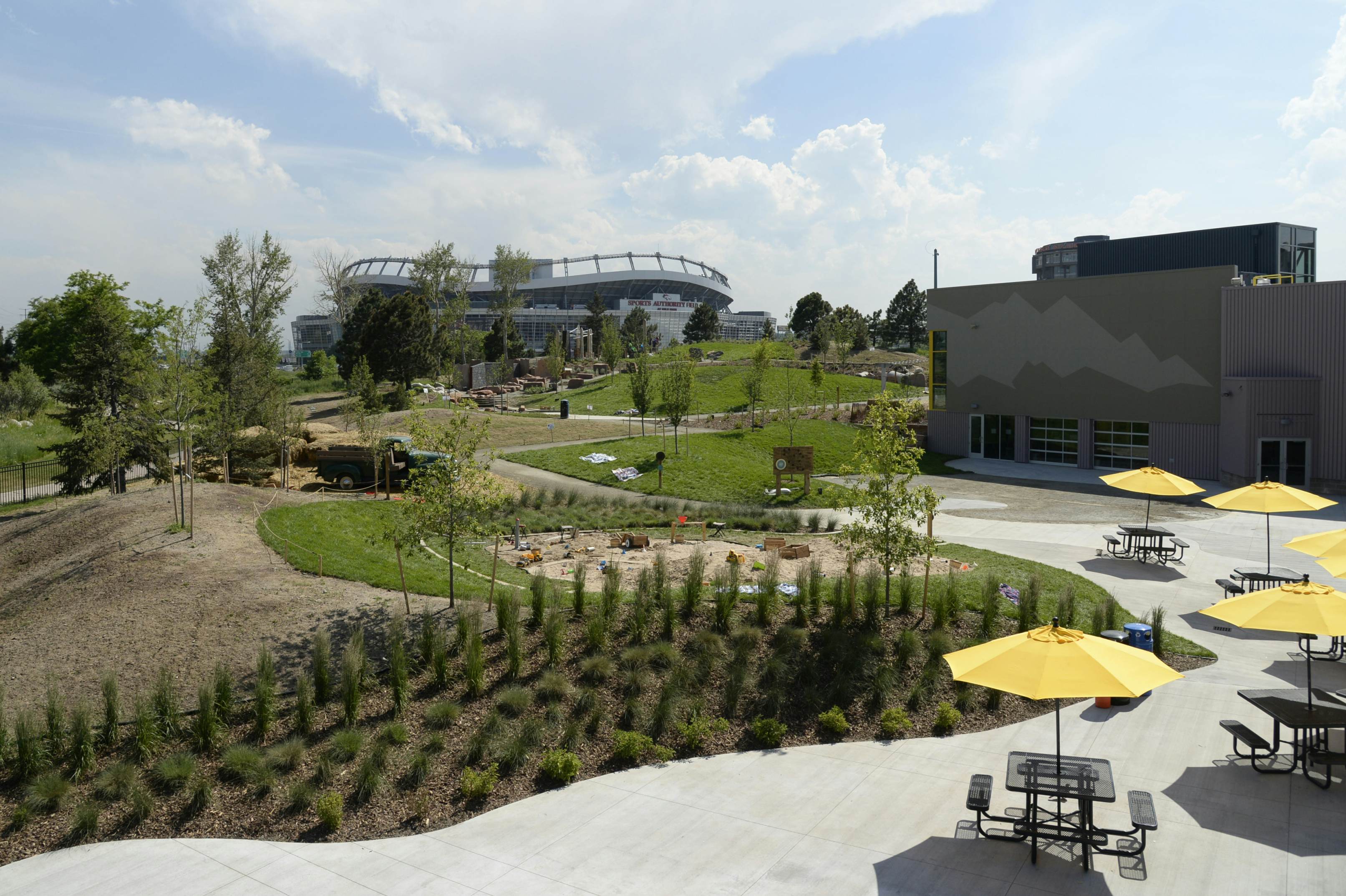 DENVER, CO - June 23: Joy Park is separated into many areas that include sand, water and even a fort building area Tuesday, June 23, 2015 at the Denver Children's Museum in Denver, Colorado. The one acre park opened behind the museum which includes a sand area, zip line and water play area for children and parents alike. (Photo By Brent Lewis/The Denver Post via Getty Images)